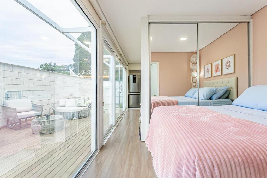Postel nebo postele na pokoji v ubytování Loft garden com jacuzzi no Campeche