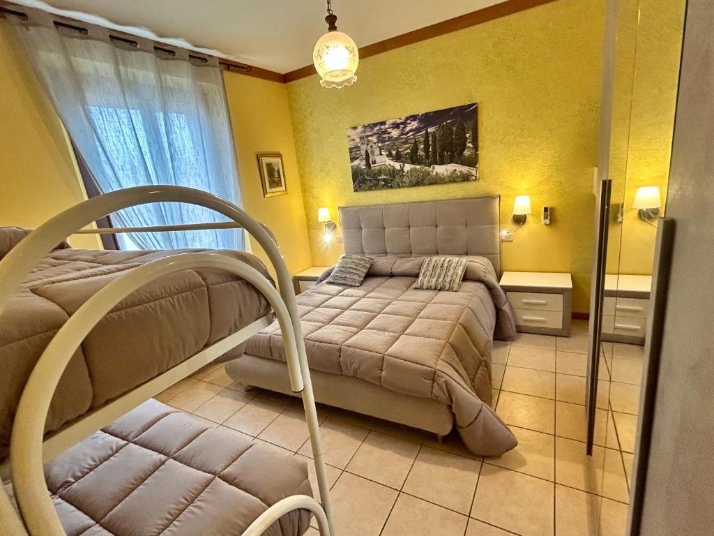 Postel nebo postele na pokoji v ubytování Agriturismo La Mora