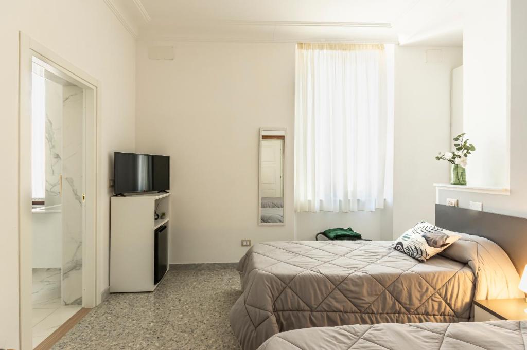Postel nebo postele na pokoji v ubytování Al CASTELLO AVEZZANO