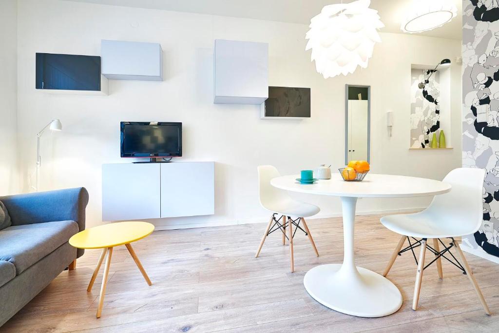 Televízia a/alebo spoločenská miestnosť v ubytovaní Studio Praga