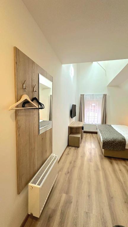 Postel nebo postele na pokoji v ubytování Hotel Karlova Prague