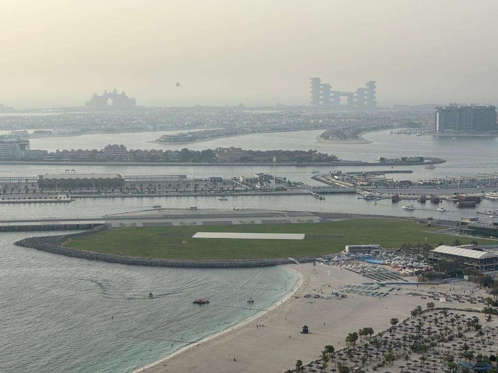 an aerial view of a beach and the water at Fabulous Palm View in Dubai