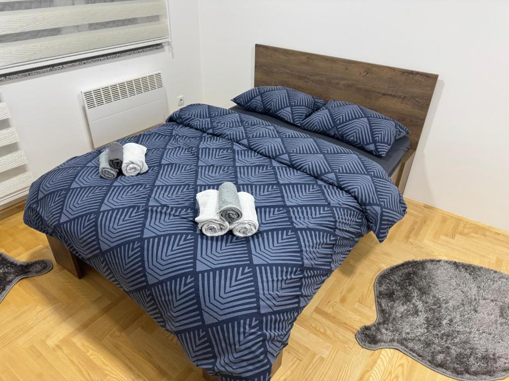 Postel nebo postele na pokoji v ubytování Studio apartman " 3M "