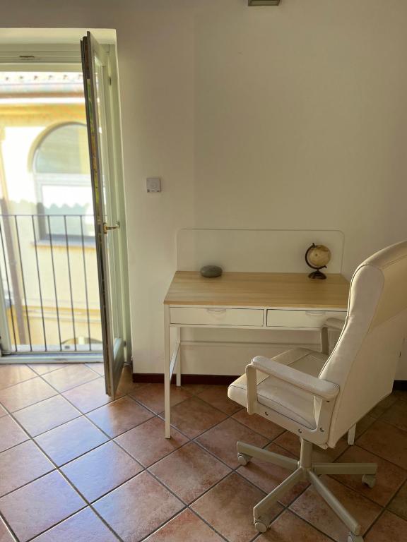 A seating area at Like Home XX Settembre