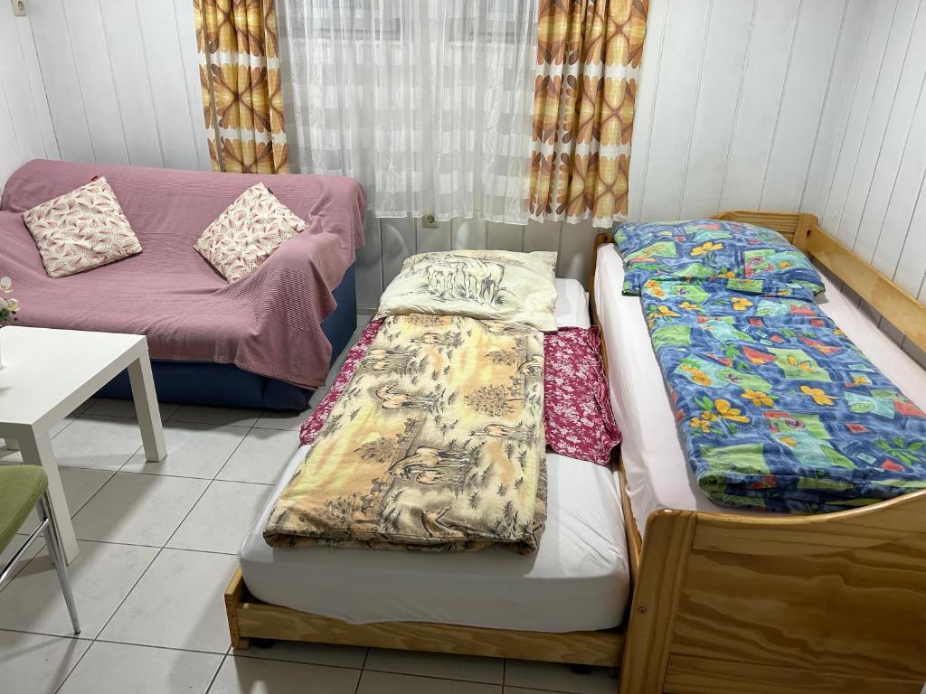 Postel nebo postele na pokoji v ubytování Bambus Wohnung