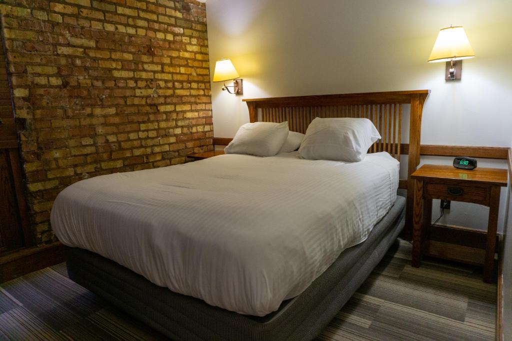 Postel nebo postele na pokoji v ubytování The Branch House & Suites By Gold Dust