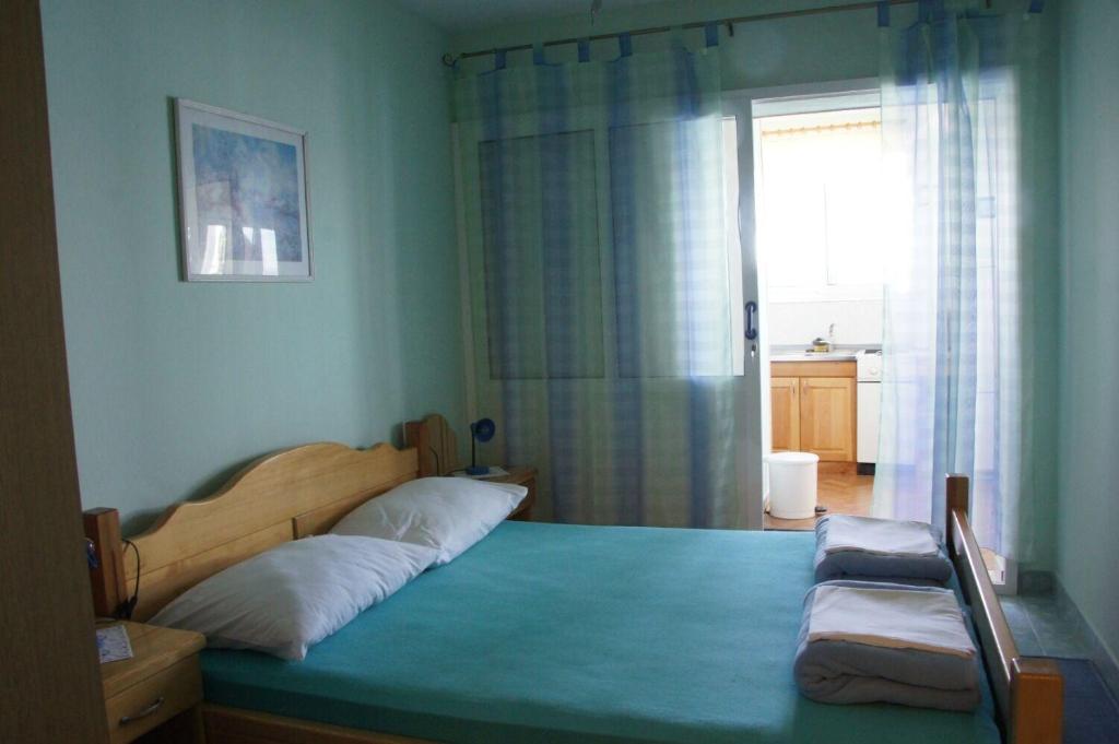Posteľ alebo postele v izbe v ubytovaní Apartments Sonja