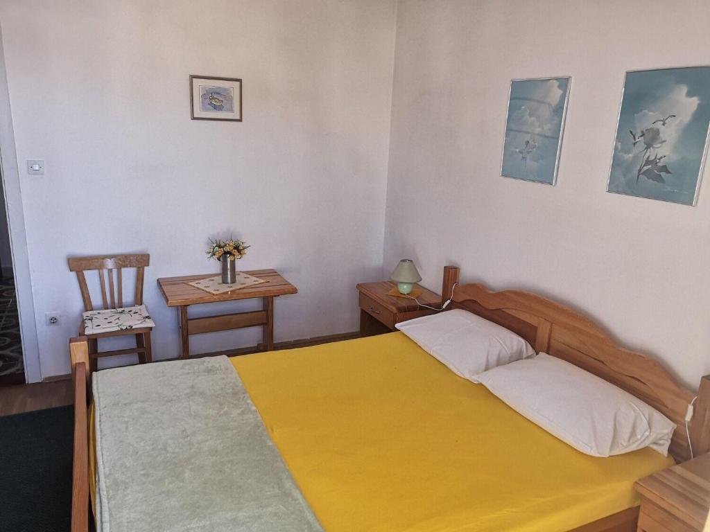 Posteľ alebo postele v izbe v ubytovaní Apartments Sonja