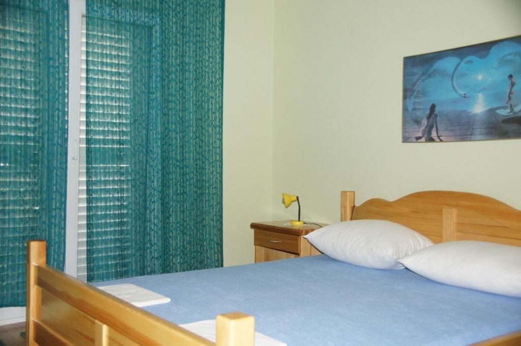Posteľ alebo postele v izbe v ubytovaní Apartments Sonja