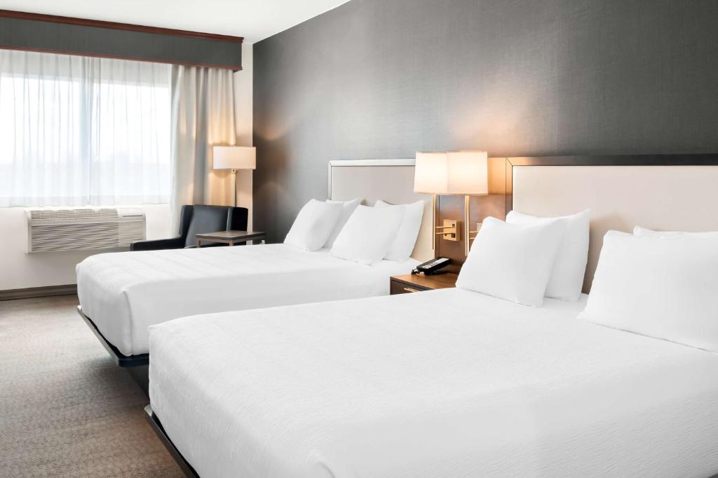 Postel nebo postele na pokoji v ubytování Best Western Plus Morden
