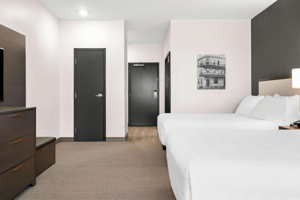 Postel nebo postele na pokoji v ubytování Best Western Plus Morden
