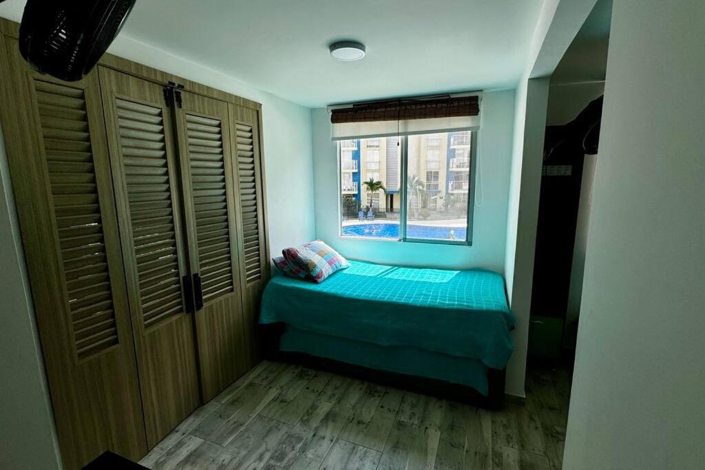 Postel nebo postele na pokoji v ubytování PA Lindo Apartamnto con Aire A