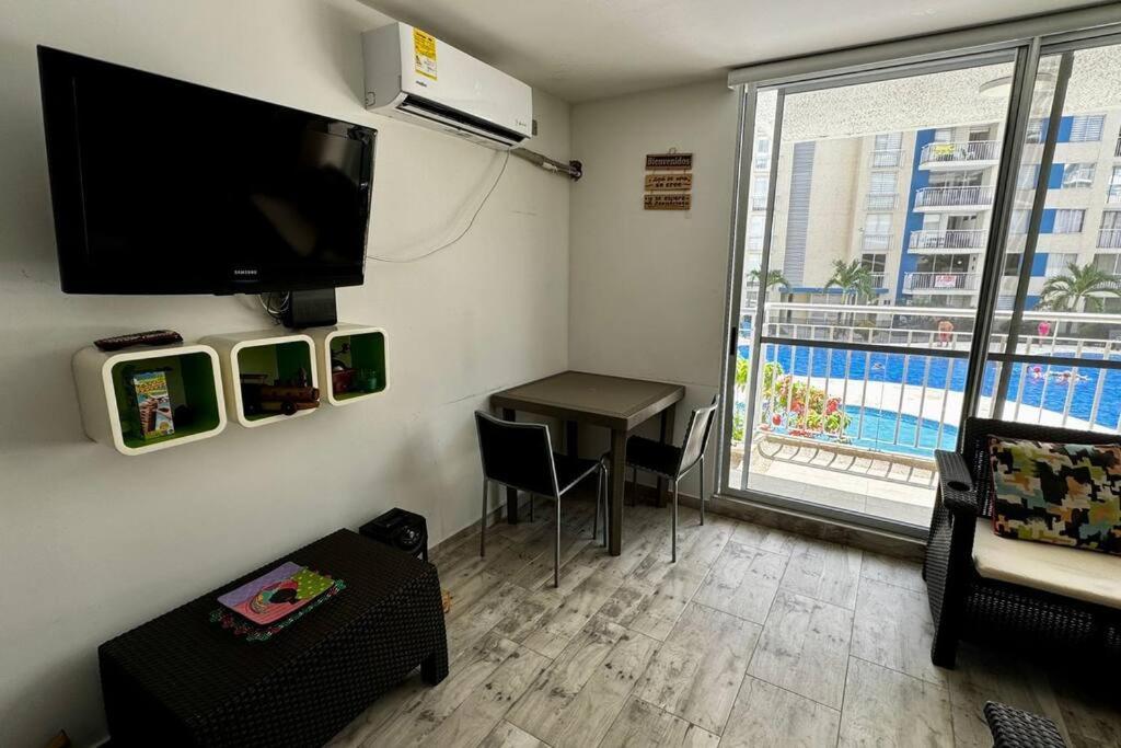 TV a/nebo společenská místnost v ubytování PA Lindo Apartamnto con Aire A