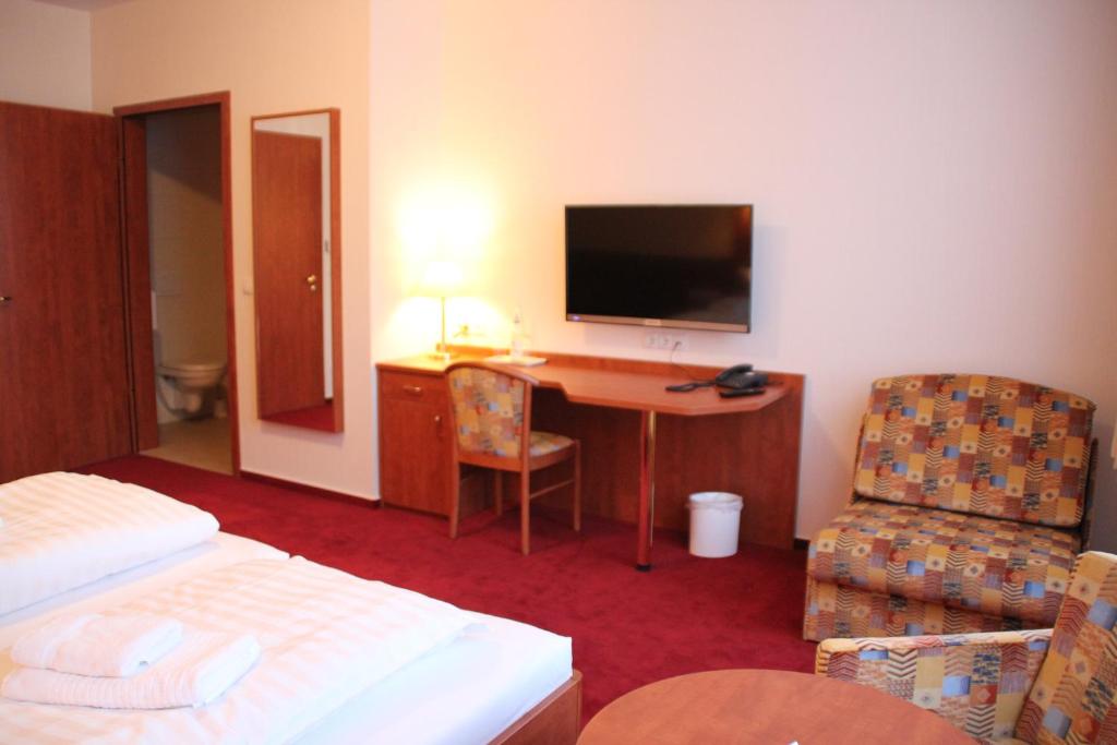 TV a/nebo společenská místnost v ubytování Hotel Thüringer Hof