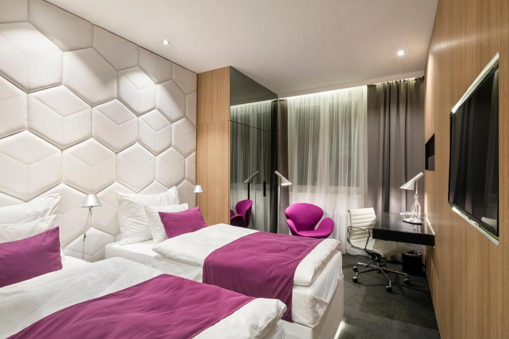 Postel nebo postele na pokoji v ubytování Pytloun Grand Hotel Imperial