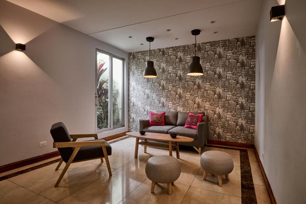 Posezení v ubytování Hotel Parque 97 Suites