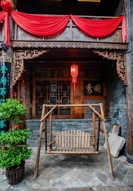 Fotografie z fotogalerie ubytování Pingyao Grand Theater Guild Hall East Garden v destinaci Pching-jao