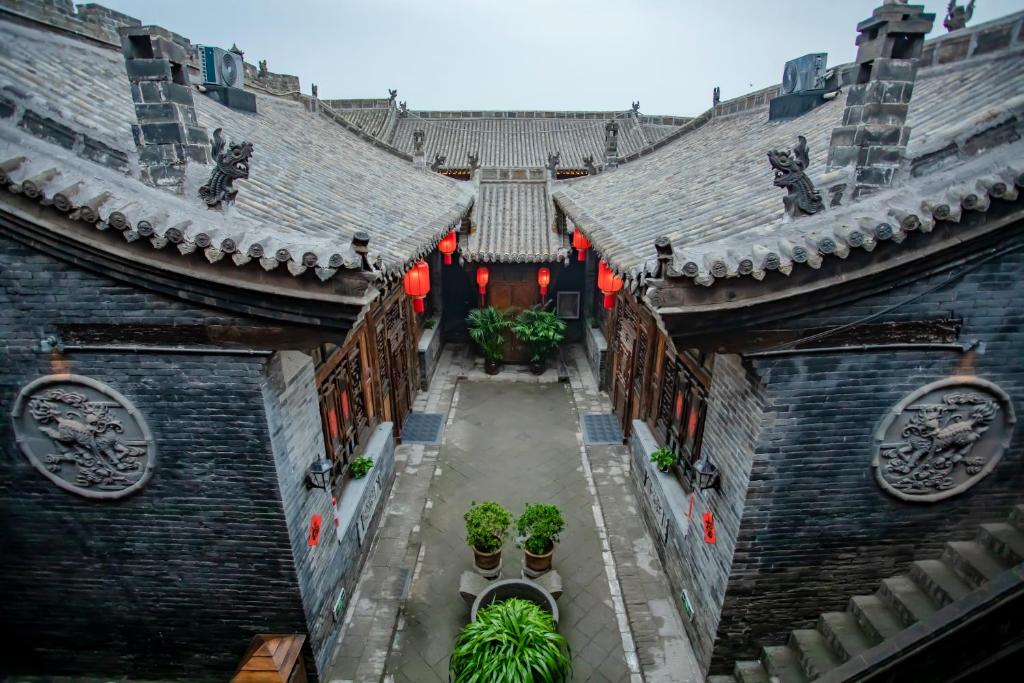 Fotografie z fotogalerie ubytování Pingyao Grand Theater Guild Hall East Garden v destinaci Pching-jao