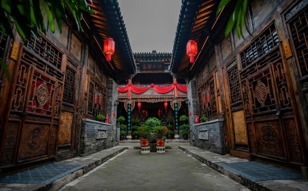Fotografie z fotogalerie ubytování Pingyao Grand Theater Guild Hall East Garden v destinaci Pching-jao