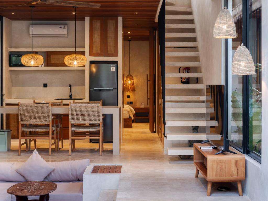 Area tempat duduk di Blacksand Villas Echo Beach, Canggu