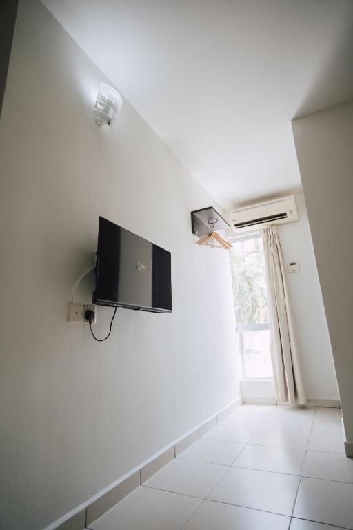 TV a/nebo společenská místnost v ubytování ND Hotel Melaka