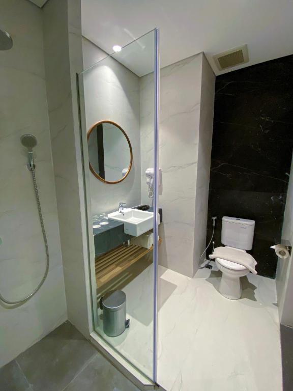 Koupelna v ubytování Nata Azana Hotel Ngawi