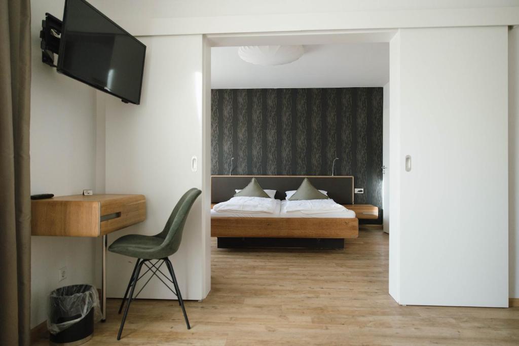 Postel nebo postele na pokoji v ubytování Feelfalt Hotel