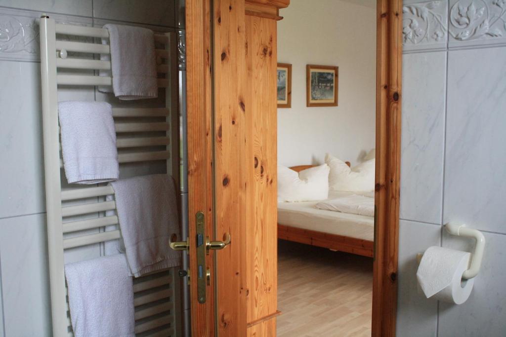 Postel nebo postele na pokoji v ubytování Pension Treenehof