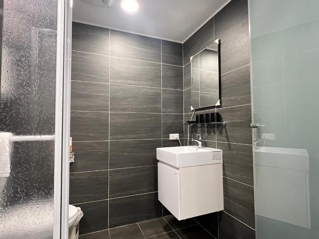 Koupelna v ubytování 悦心旅Yesing Hotel