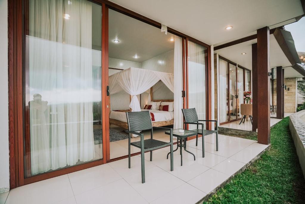 Posezení v ubytování Bhuana Agung Villa and Restaurant