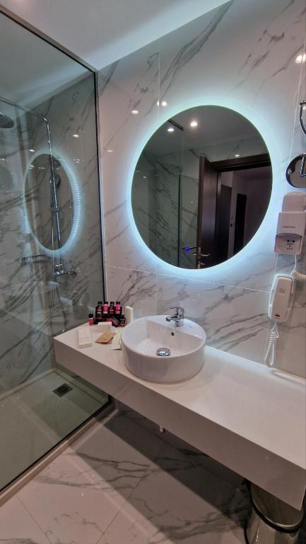 Koupelna v ubytování International Atene hotel