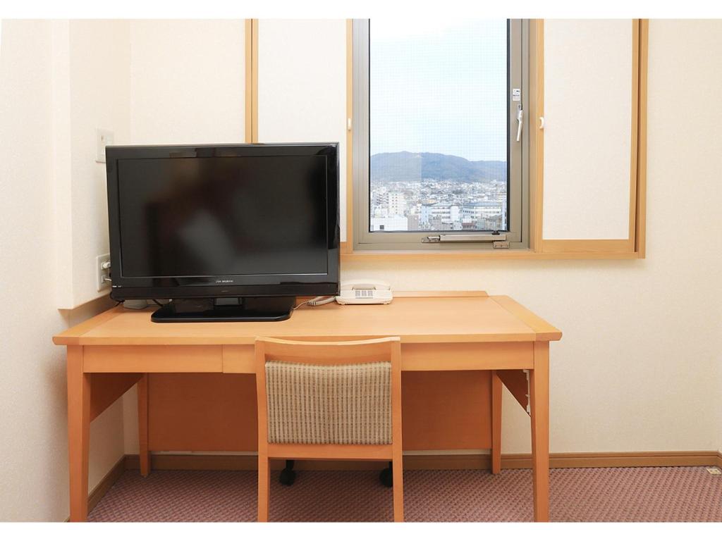 TV a/nebo společenská místnost v ubytování Smile Hotel Nara