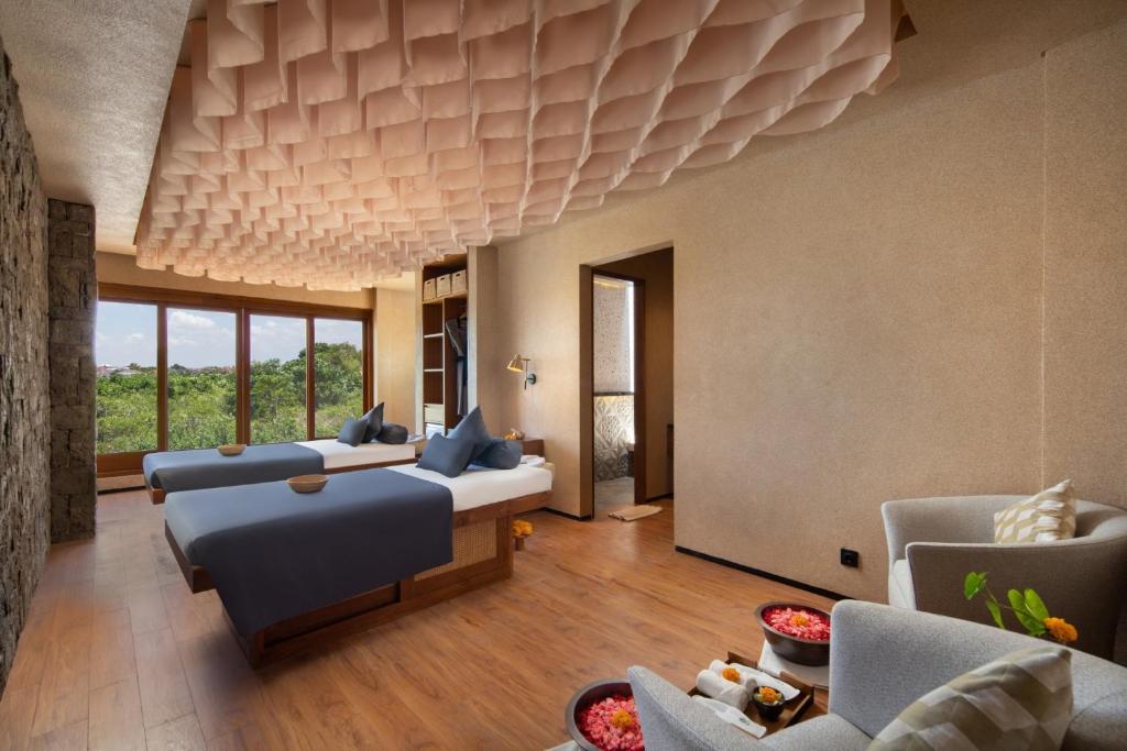 Postel nebo postele na pokoji v ubytování Sini Vie Luxury Resort & Spa Seminyak by Ini Vie Hospitality