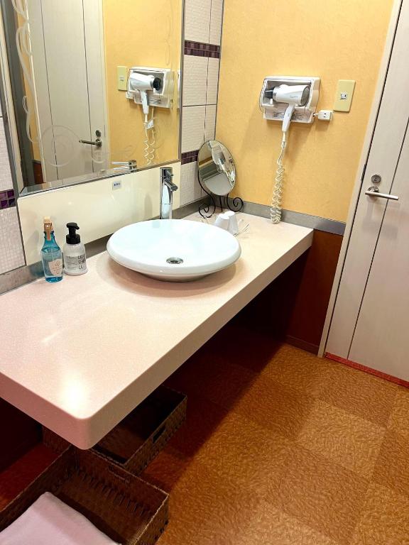 Koupelna v ubytování 富士Outlet温泉Hotel