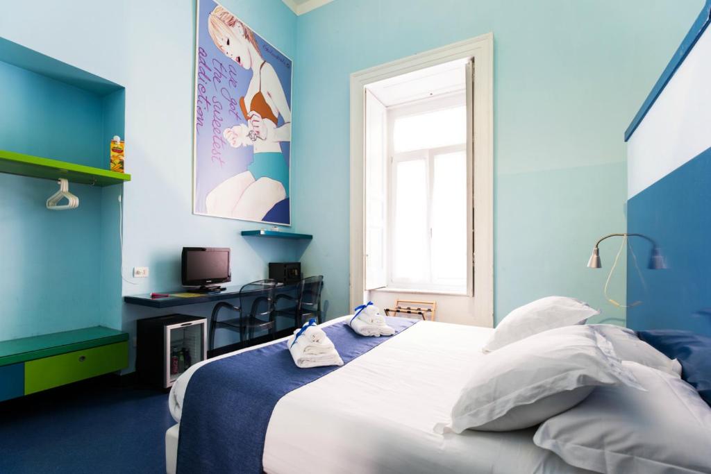 Posteľ alebo postele v izbe v ubytovaní Correra 241 Lifestyle Hotel