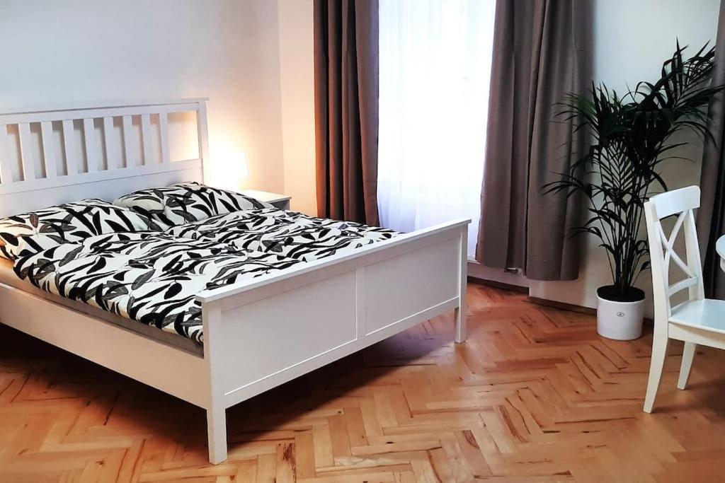 Posteľ alebo postele v izbe v ubytovaní Arbes apartman