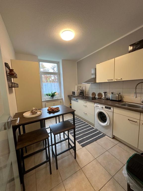 Kuchyň nebo kuchyňský kout v ubytování Ferienwohnung Zeitz Appartment Moritzburg