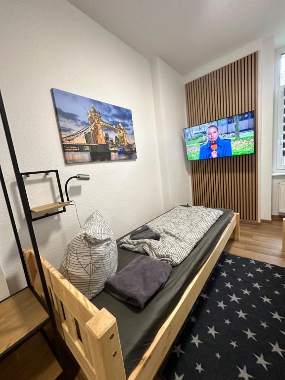 Postel nebo postele na pokoji v ubytování Ferienwohnung Zeitz Appartment Moritzburg
