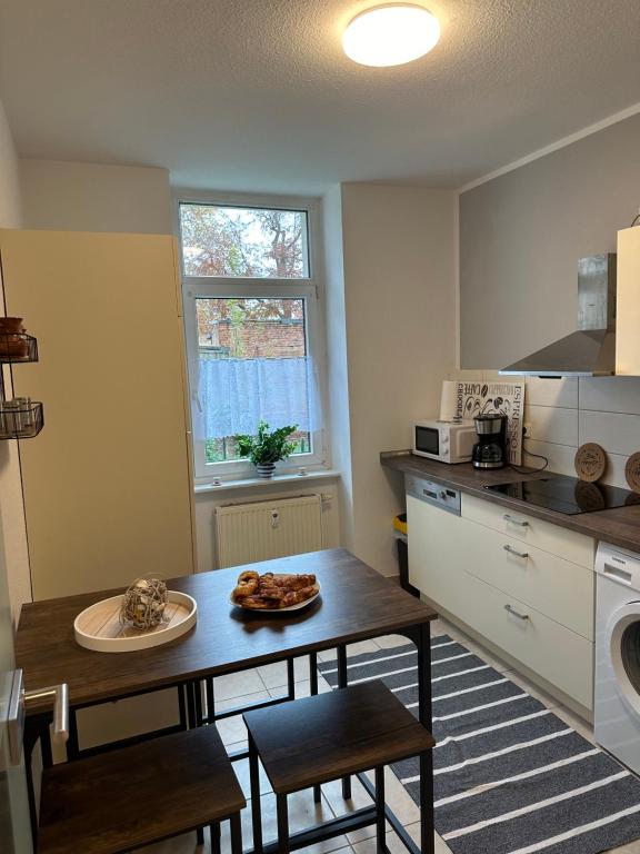 Kuchyň nebo kuchyňský kout v ubytování Ferienwohnung Zeitz Appartment Moritzburg