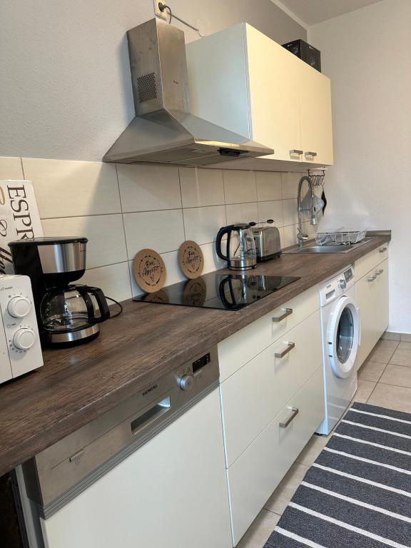 Kuchyň nebo kuchyňský kout v ubytování Ferienwohnung Zeitz Appartment Moritzburg