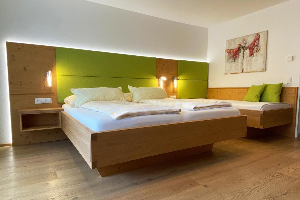 Postel nebo postele na pokoji v ubytování B&B Landhaus Vierthaler