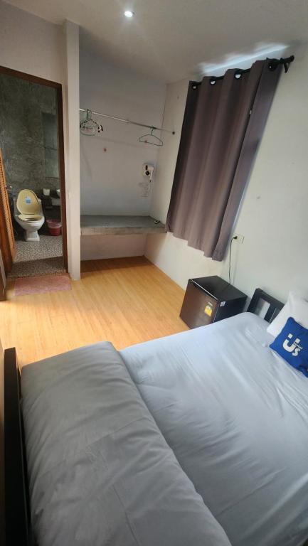 Postel nebo postele na pokoji v ubytování Us hostel samui