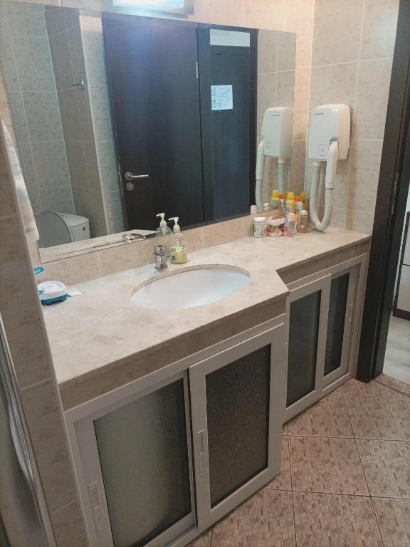Koupelna v ubytování Studio w Hotel Grand