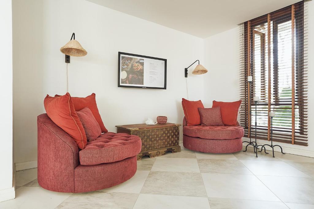 Posezení v ubytování Paradise Cove Boutique Hotel (Adults Only)