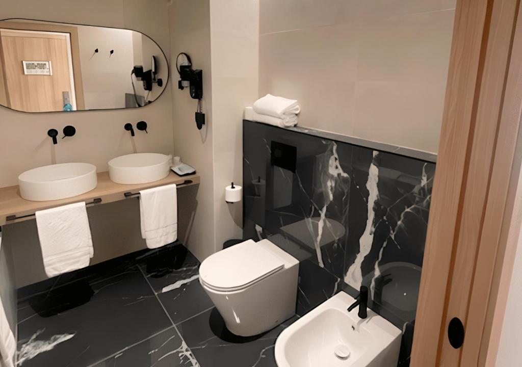 Koupelna v ubytování Hotel Real