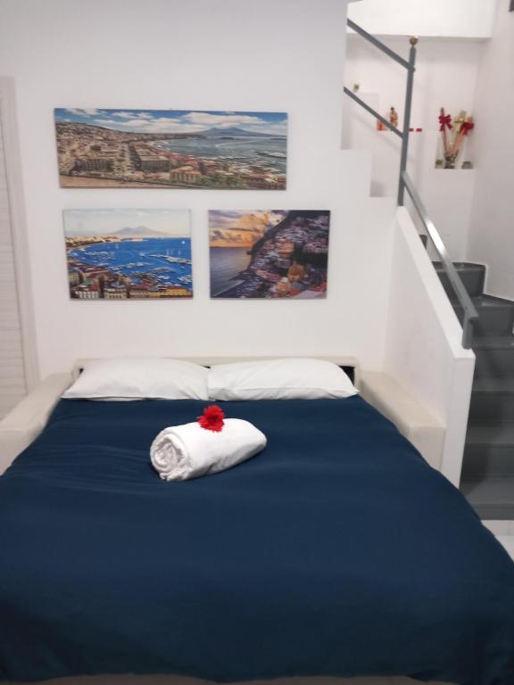 Posteľ alebo postele v izbe v ubytovaní L'antico Borgo Angioino