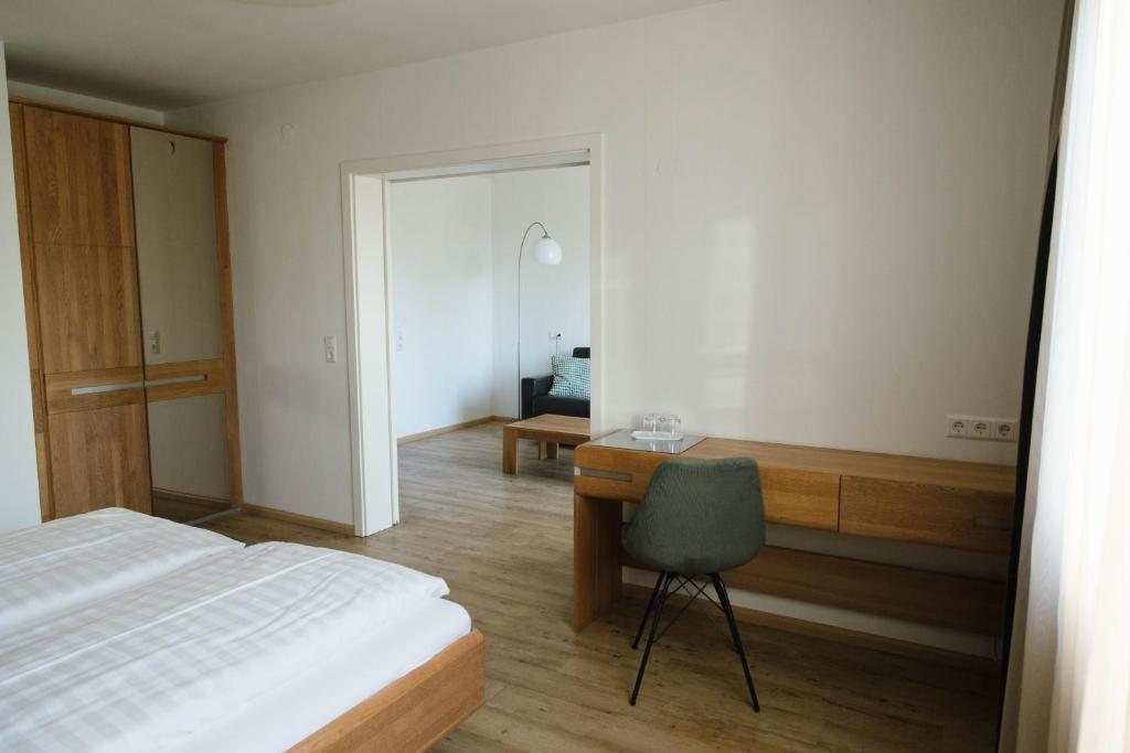Postel nebo postele na pokoji v ubytování Feelfalt Hotel