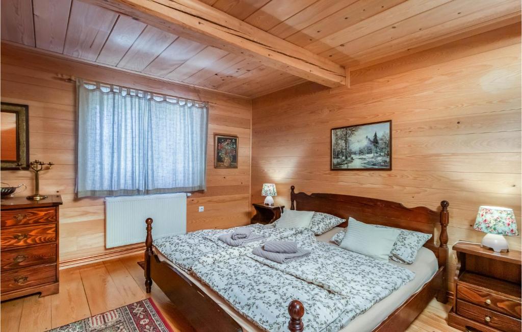 Postel nebo postele na pokoji v ubytování Cozy Home In Mrkopalj With Jacuzzi