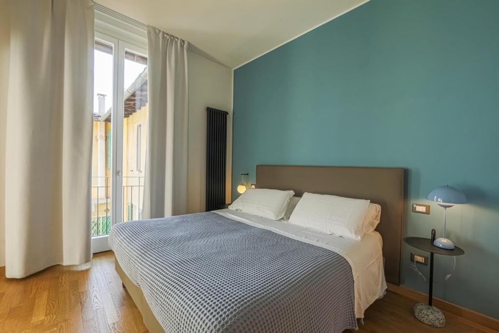 Ένα ή περισσότερα κρεβάτια σε δωμάτιο στο Sweetly Home in Florence
