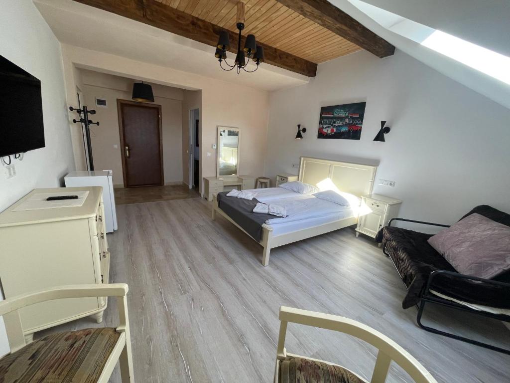 Postel nebo postele na pokoji v ubytování Guest House Hena